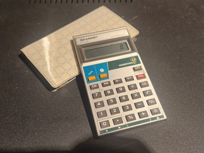 1980s  Sharp Vintage Wondertopia WN-102 LCD Game Style Calculator -read - 