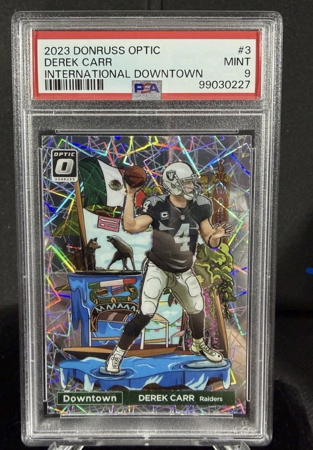 PSA 9 Derek Carr 2023 Donruss Optic International Downtown #3 Raiders Case Hit