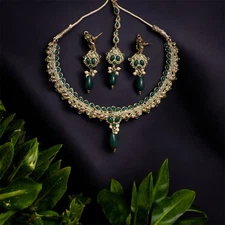 Green Stone Studded Indian Bollywood Necklace with Earrings and Tikka