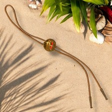 Vintage Hawaiian Bolo Tie Mens Coastal Cowboy Brass 3D Medallion Fabric Chord