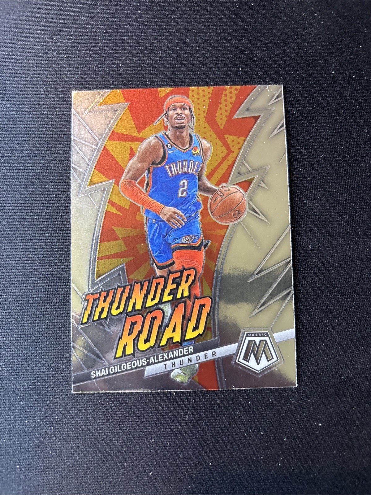 Shai Gilgeous Alexander #14 Basketball Cards 2022 Panini Mosaic Thunder Road trading card — raw and PSA graded price guide