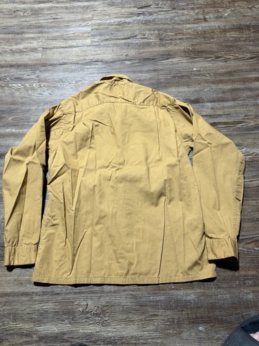 Light brown vintage Fruit Of The Loom men’s button-up shirt, size small, with long sleeves and back zipper closure.