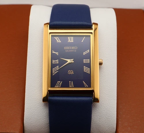 Vintage Seiko Slim Quartz Men's Wrist Watch Blue Dial with Blue Strap.
