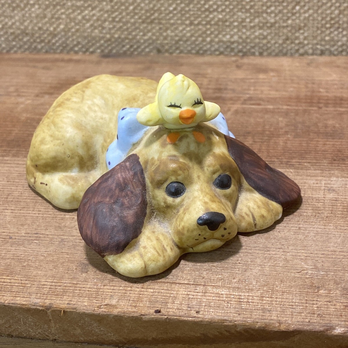 Vintage Cocker Spaniel Laying Down With Blue Bow And Happy Chick