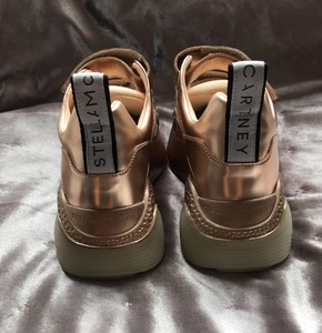 gold chunky sneakers