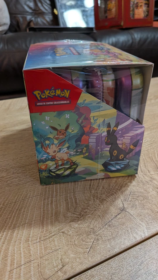 Prismatic Evolutions SEALED Mini Tin Display Box Full Set of 8 Tins - SPANISH - Image 2 of 4