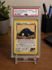 The Pokémon Company PSA 10 1st Edition 2000 Gym Heroes Rocket's Snorlax 33/132