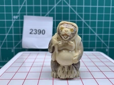 3332390 Signed Carved Netsuke Mythological: Tanuki