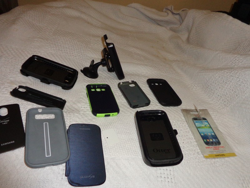 lot of vintage phone holders various companies
