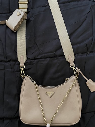 At Auction: Prada - Odette Saffiano Leather Silver Belt Bag/Crossbody