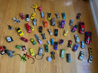 Mixed toys cars, figures race cars, trucks, motorcycles, superhero car, dinosaur