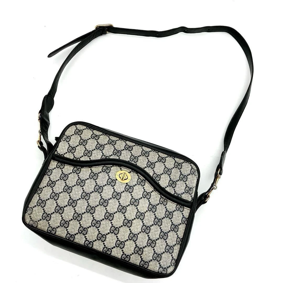 Sac bandoulière Gucci GG motif logo GG Supreme cuir PVC main bleu beige marine