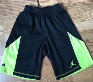 black and yellow jordan shorts