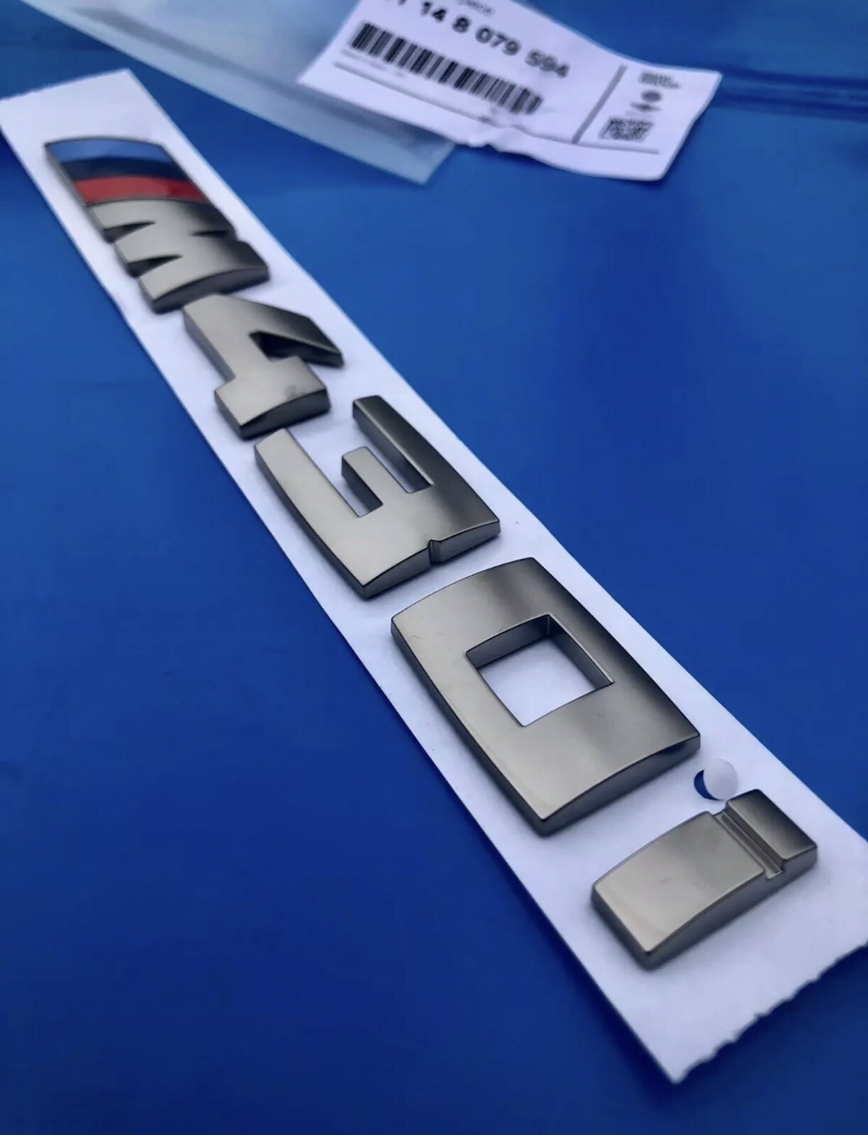 Insigne M430i gris cérium d'origine pour personnaliser le coffre de votre coupé Série 4