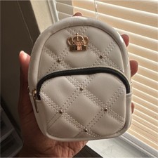 White Quilted Zippered Makeup Bag with Crown Accent, Synthetic Leather