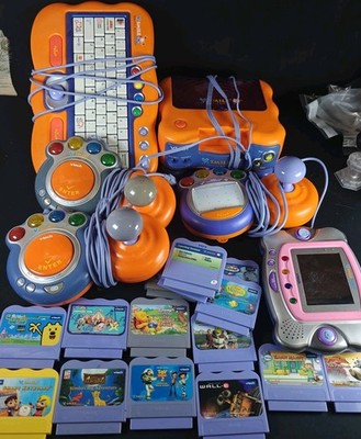 Vtech Vsmile TV Learning System/Pocket Controllers + Games/Car Adapter Keyboard