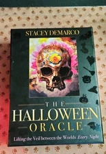 The Halloween Oracle Deck and guide book.
