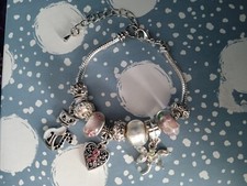 Pandora Facsimile, Braccialetto orologio con charm differenti, e varie misure