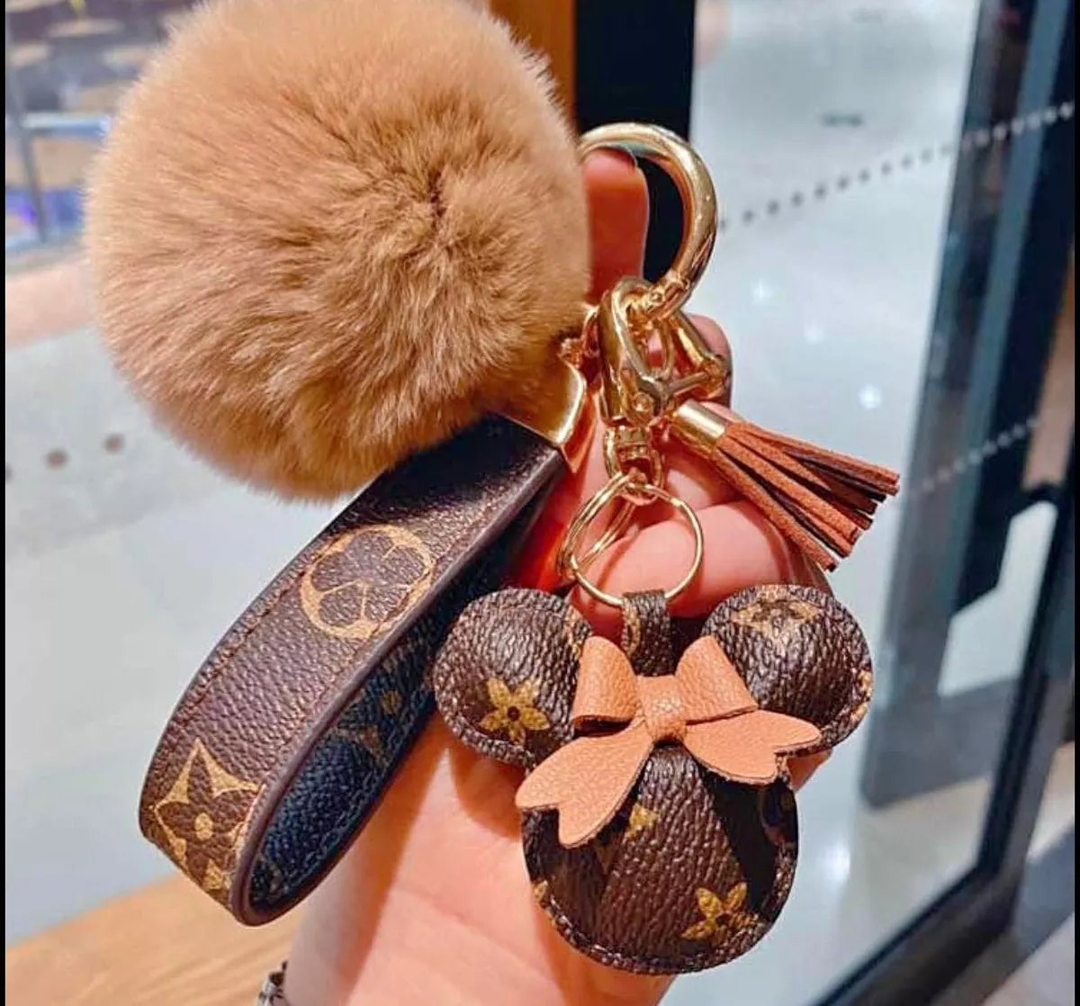 lv pom pom keychain