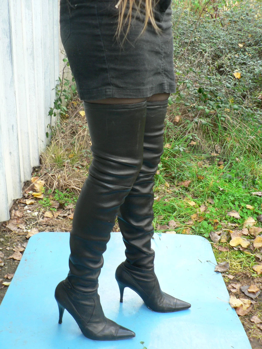 PAIR OF BLACK LEATHER KNEE-HIGH HEEL BOOTS, CHANEL