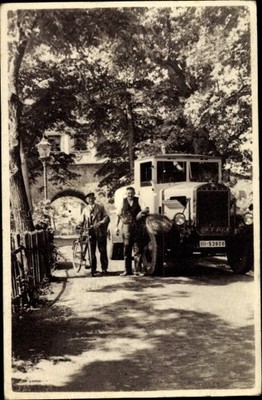 Photo Truck on a Road, Men, Bicycle, Vehicle License Plate III 50908 - 10467141