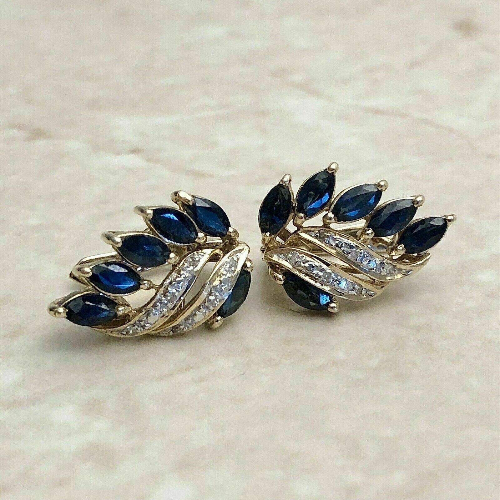 Pendientes de tachuelas de zafiro azul simulado corte marquesa de 1,30 quilates enchapados en oro amarillo 14 K