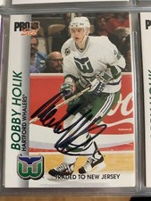 5 Bobby Holik hockey cards.  1 card autographed 