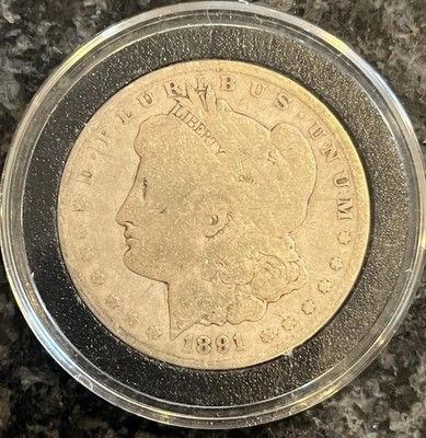 1891-CC $1 Morgan Silver Dollar over 25 years in family collection.