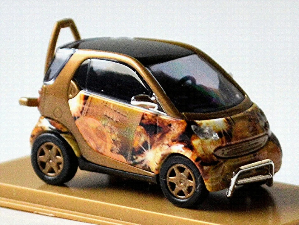 Smart Fortwo 07 Gold-Smart Smart 451 2007-10 2ª Generazione 1:87 Busch 46185 - Immagine 3 di 4