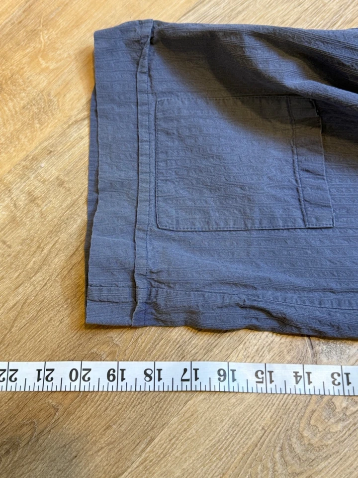 Pantalones cortos de lino para mujer pequeños de algodón con textura azul pierna ancha Foto 3 de 4