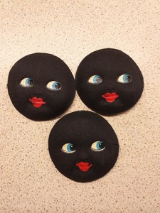 black fabric dolls