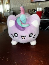 Meowchi Tasty peach by Aurora purple plush caticorn.