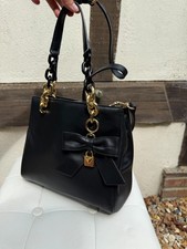 Sac à main Michael Kors en cuir noir et bijouteries couleur or
