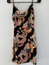 Urban Outfitters UO Mallory Cowl Slip Mini Dress with a black, orange, and white