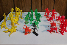 lot of 37 plastic cowboys  Indians 3 inches tall red green  yellow 60s or 70s