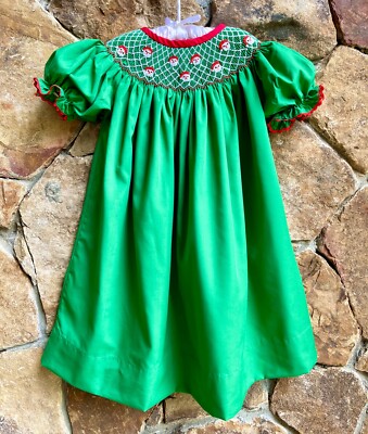 white christmas dresses Light Heirloom Ivory Bishop Dress With Red Smocking – Pleats and Stitches main image 1