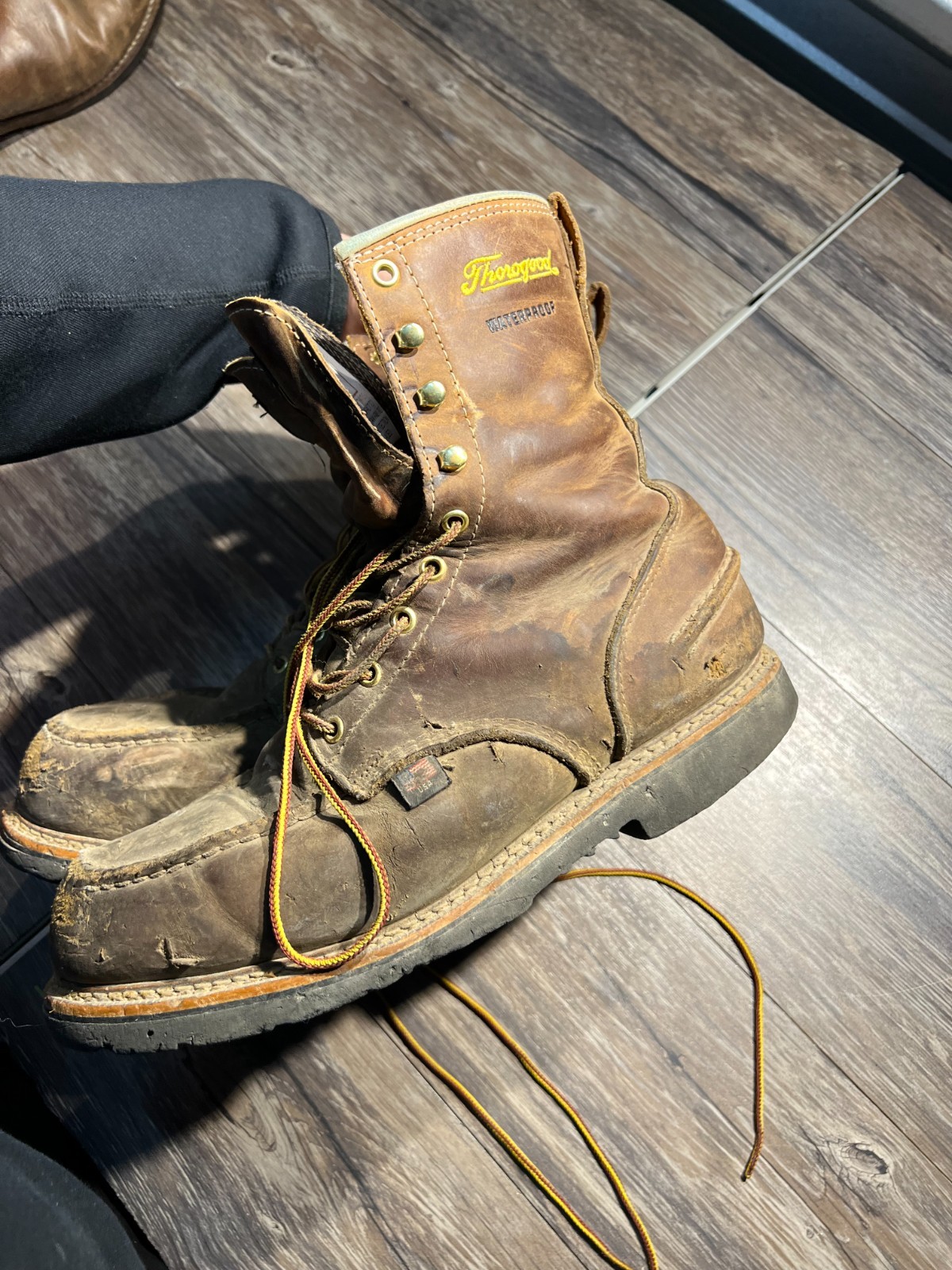 Thorogood 804-3898 men’s moc toe waterproof boots with brown leather uppers, black laces, and visible Thorogood logo.
