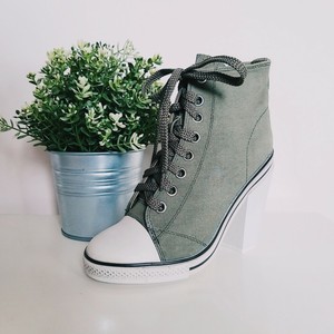 white heeled trainers