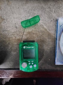 Sega Dreamcast Controller, Green Dreamcast VMU and 2 Dreamcast Games