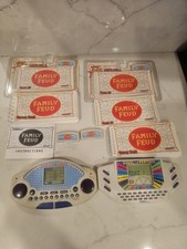 Lot 2 Handheld Games Wheel of Fortune, Family Feud Tiger With Extras