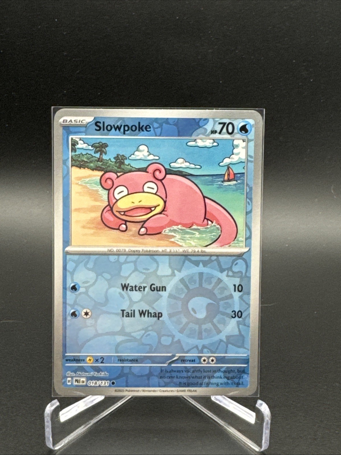 Slowpoke 018/131 - Prismatic Evolutions Reverse Holo Pokemon NM