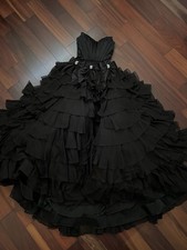 sherri hill slit black maxi dress with ruffled skirt and bow detail prom dress
