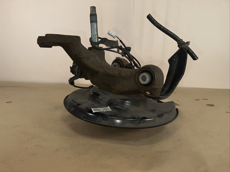 Toyota Prius 2016-22 lado del conductor rueda delantera izquierda buje y cojinete OEM Foto 2 de 4