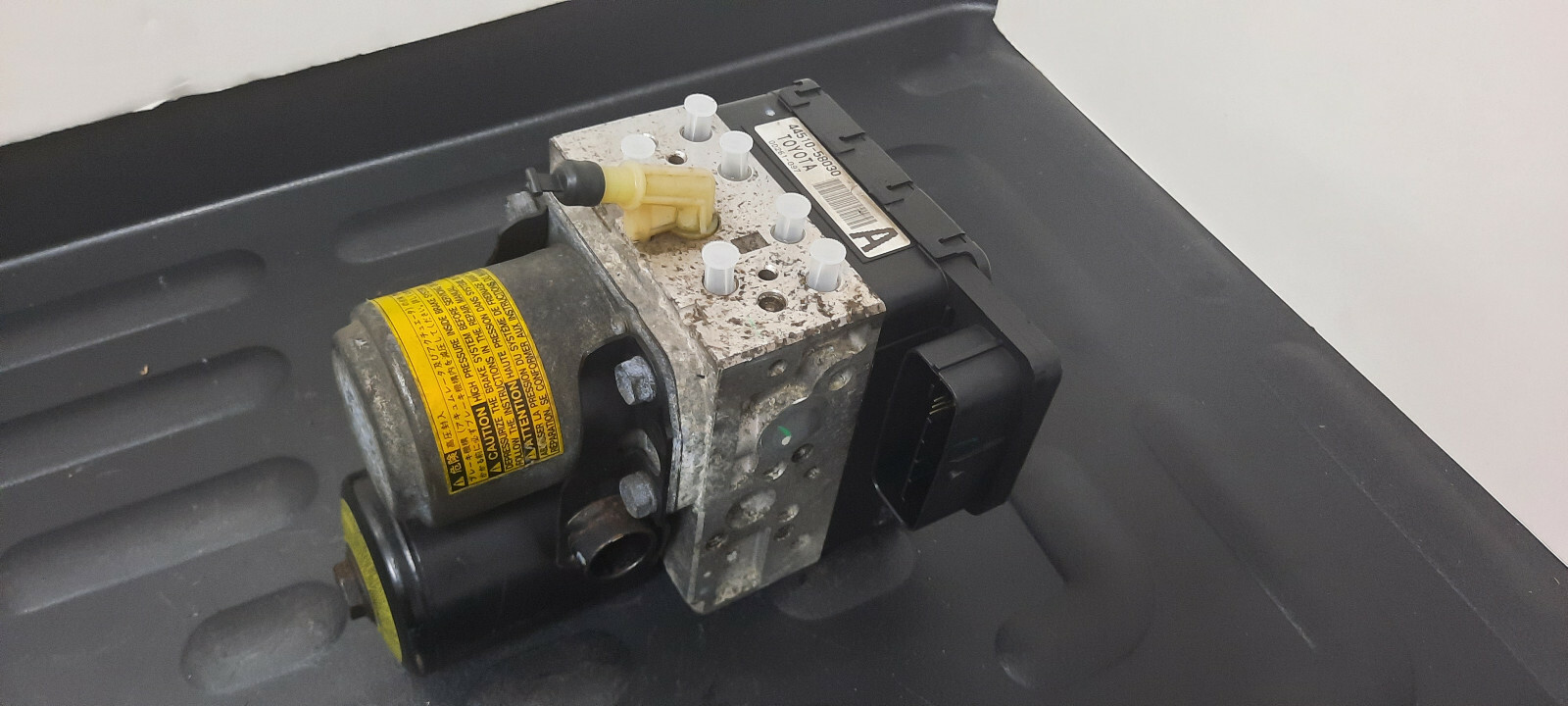 4451058030 A TOYOTA CAMRY HYBRID ABS PUMP ACTUATOR ASSEMBLY ORIGINAL