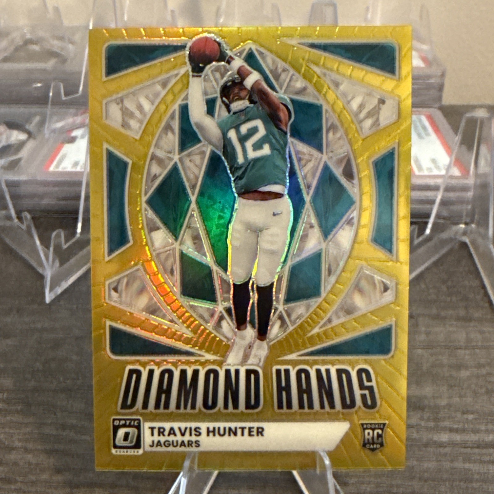 Travis Hunter 2025 Panini Donruss Optic Diamond Hands Gold 10/10 #1