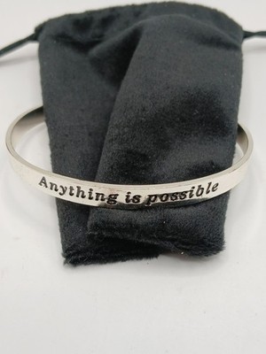 Silver Toned cuff bracelet Anything is possible with Cross Charm  marked NRO
