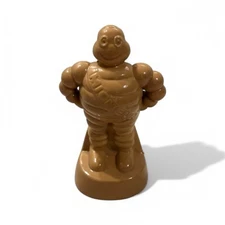 Michelin Man Bibendum Coin Piggy Bank yellow muffler Figure Ivory Vintage