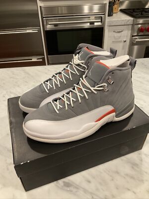white and orange jordan 12