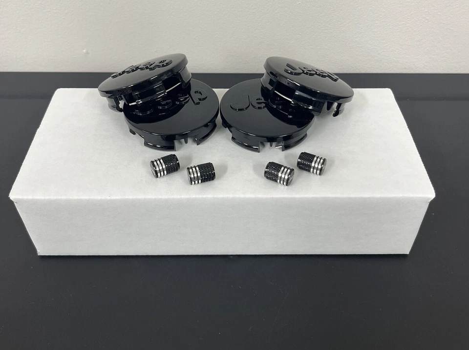 Tapacubos centrales para llantas y tapones de aire para neumáticos Jeep negros Cherokee Wrangler Liberty Compass Foto 4 de 4