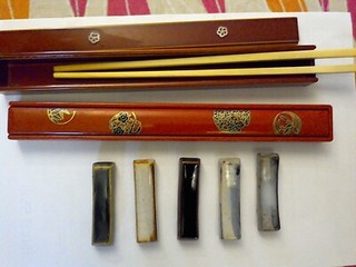 2 pairs chopsticks in boxes and 5 ceramic chopstick rests vgc